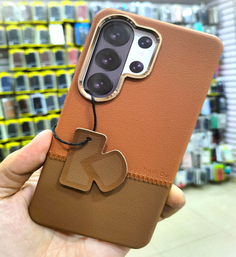  جراب وغطاء حماية سامسونج S26 Ultra بخامة قماشية ناعمة ثنائية اللون – تصميم فاخر بملمس راقٍ مع إطار مرتفع لحماية الكاميرات ومقاومة للصدمات اليومية. 